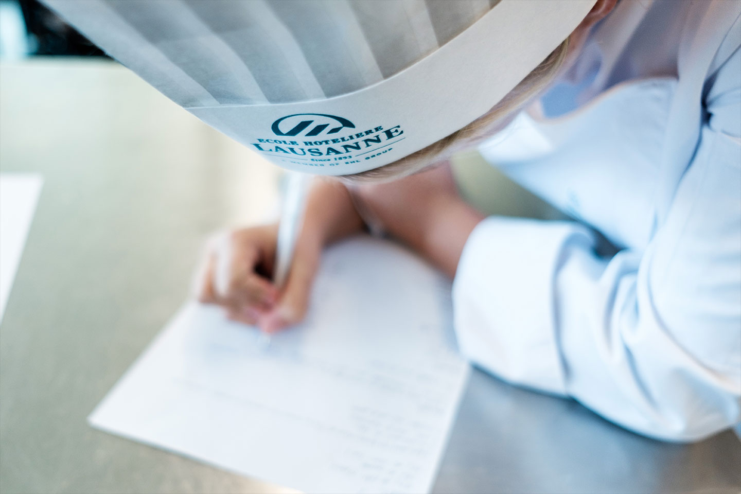 Why do chefs wear white?